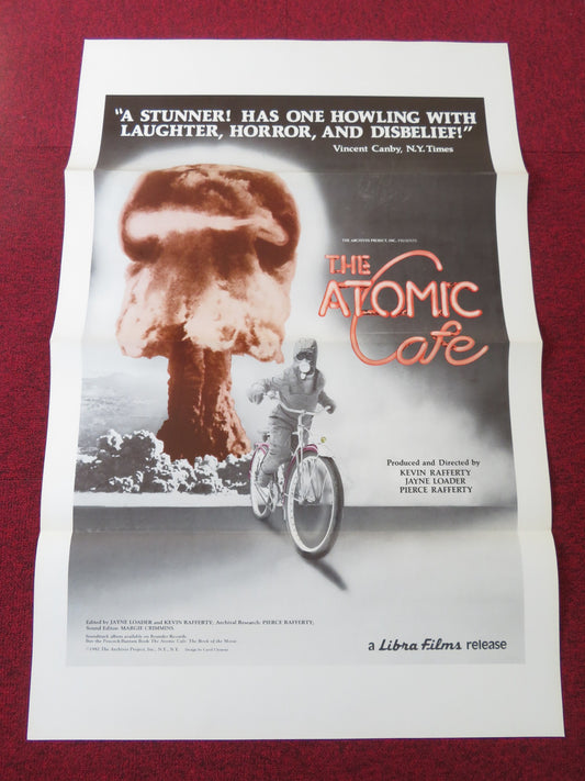 THE ATOMIC CAFE US TRI FOLDED ONE SHEET ROLLED POSTER PAUL TIBBETS TRUMAN 1982